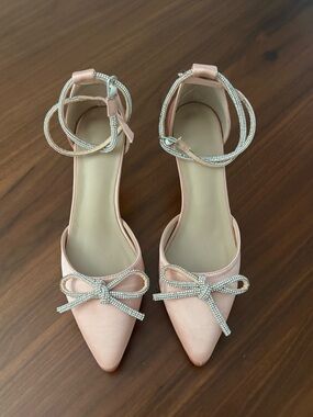 Elegant baby pink satin kitten heels